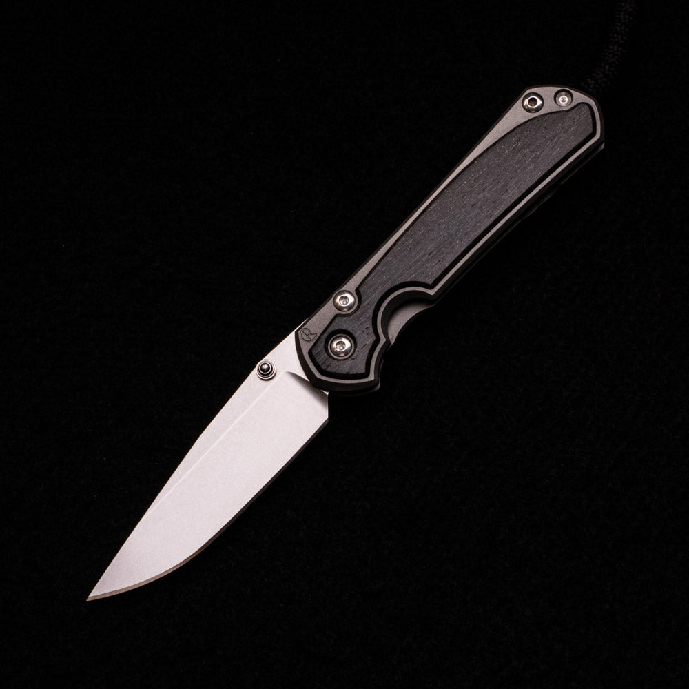 CHRIS REEVE SMALL SEBENZA 31 BOG OAK INLAY – CPM MAGNACUT BLADE – SILVER DOUBLE THUMB LUGS