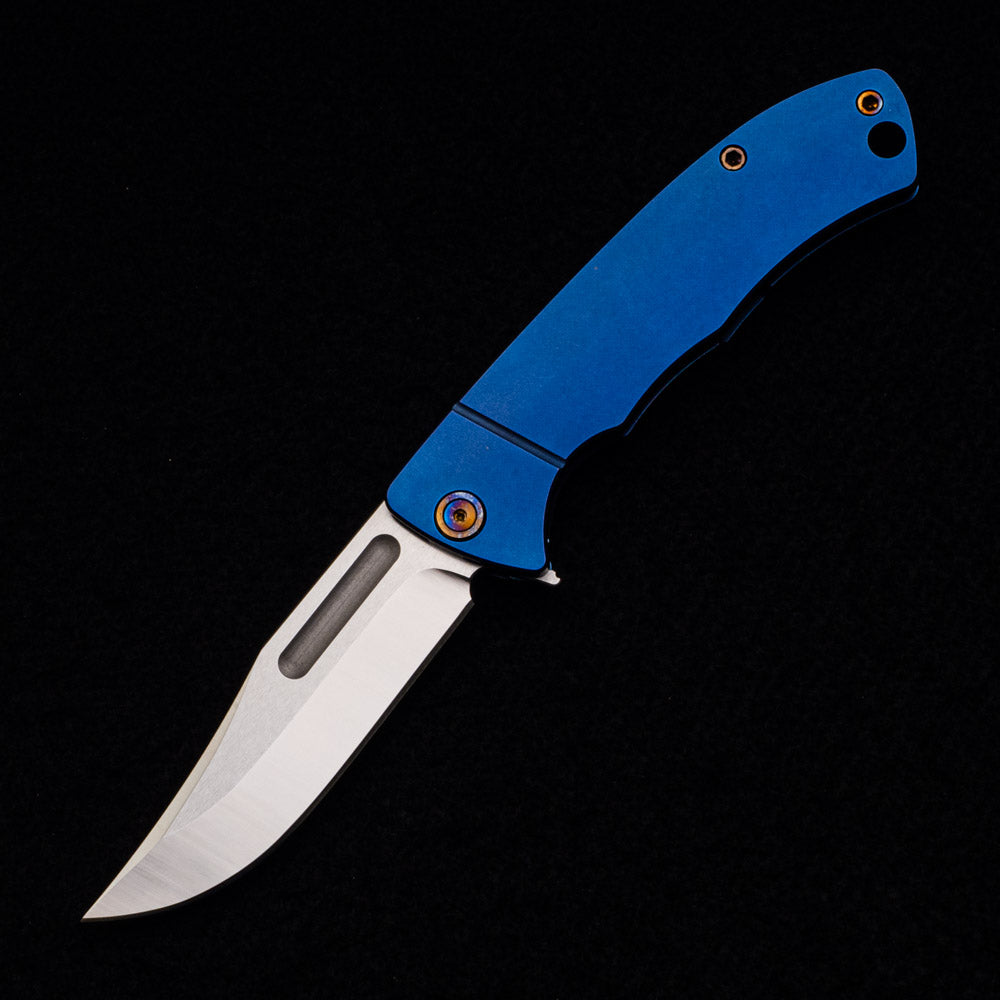 Vehement Knives Mongrel – S45VN Blade – Blue Titanium Handle – Flamed Hardware