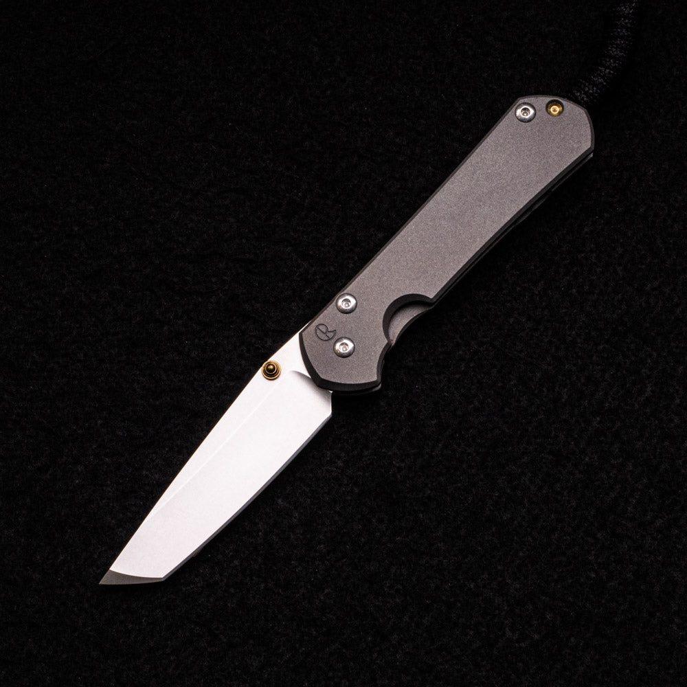 CHRIS REEVE SMALL SEBENZA 31 – GOLD DOUBLE THUMB LUGS – TANTO CPM MAGNACUT BLADE