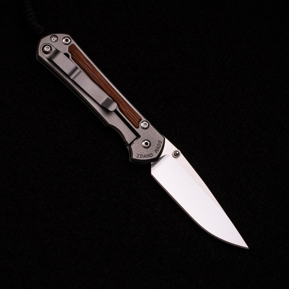 CHRIS REEVE SMALL SEBENZA 31 NATURAL CANVAS MICARTA INLAY – POLISHED CPM MAGNACUT BLADE – GLASS BLASTED – SILVER DOUBLE THUMB LUGS