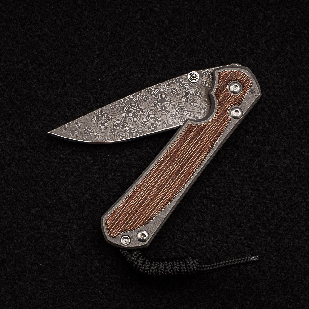 CHRIS REEVE SMALL SEBENZA 31 NATURAL CANVAS MICARTA INLAY - RAINDROP BLADE - SILVER DOUBLE THUMB LUGS