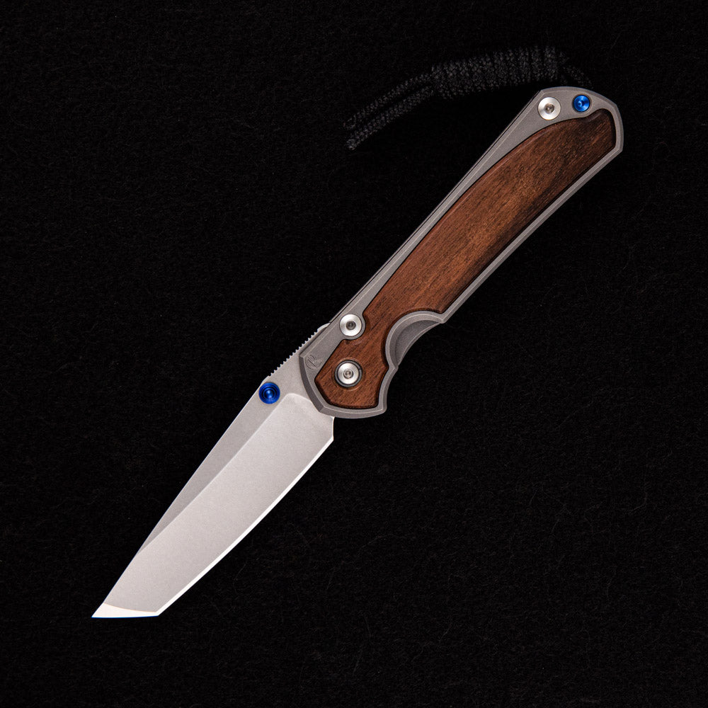 CHRIS REEVE SMALL SEBENZA 31 MACASSAR INLAY – TANTO CPM MAGNACUT BLADE – BLUE DOUBLE THUMB LUGS