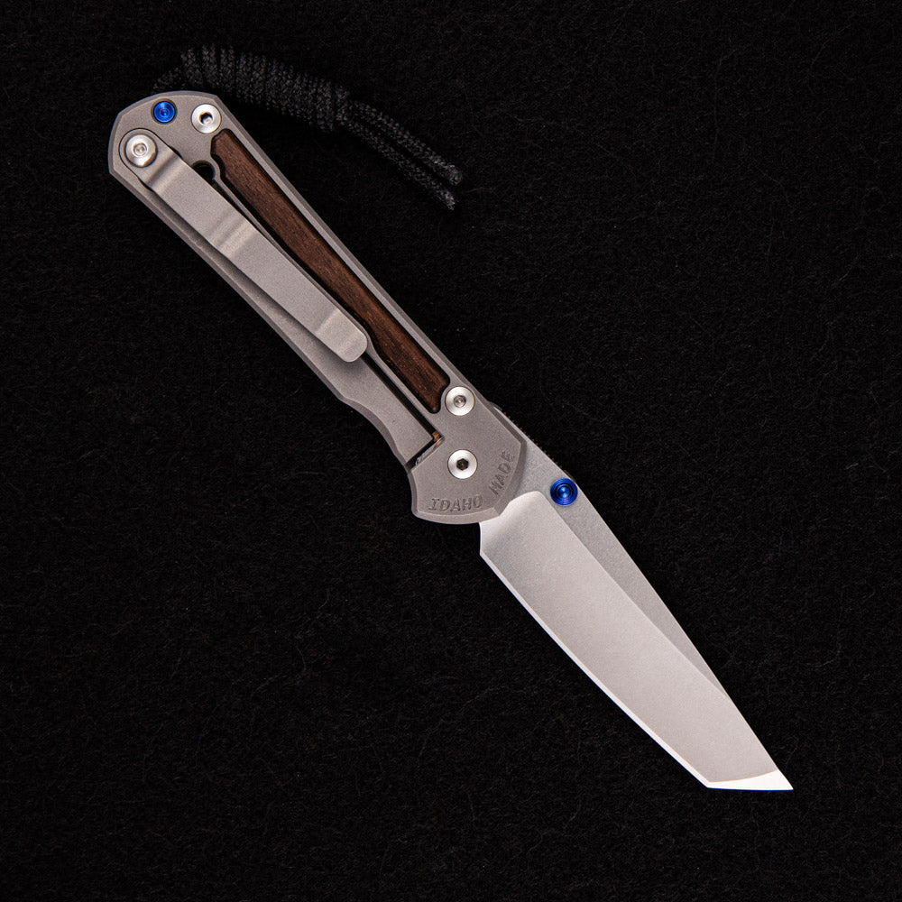 CHRIS REEVE SMALL SEBENZA 31 MACASSAR INLAY – TANTO CPM MAGNACUT BLADE – BLUE DOUBLE THUMB LUGS