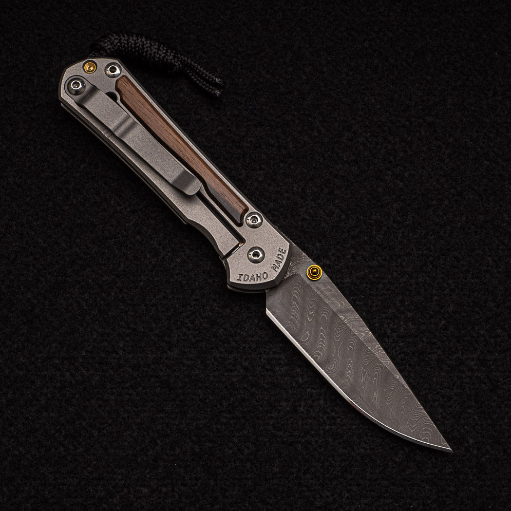 CHRIS REEVE SMALL SEBENZA 31 MACASSAR INLAY - BOOMERANG BLADE - GOLD DOUBLE THUMB LUGS