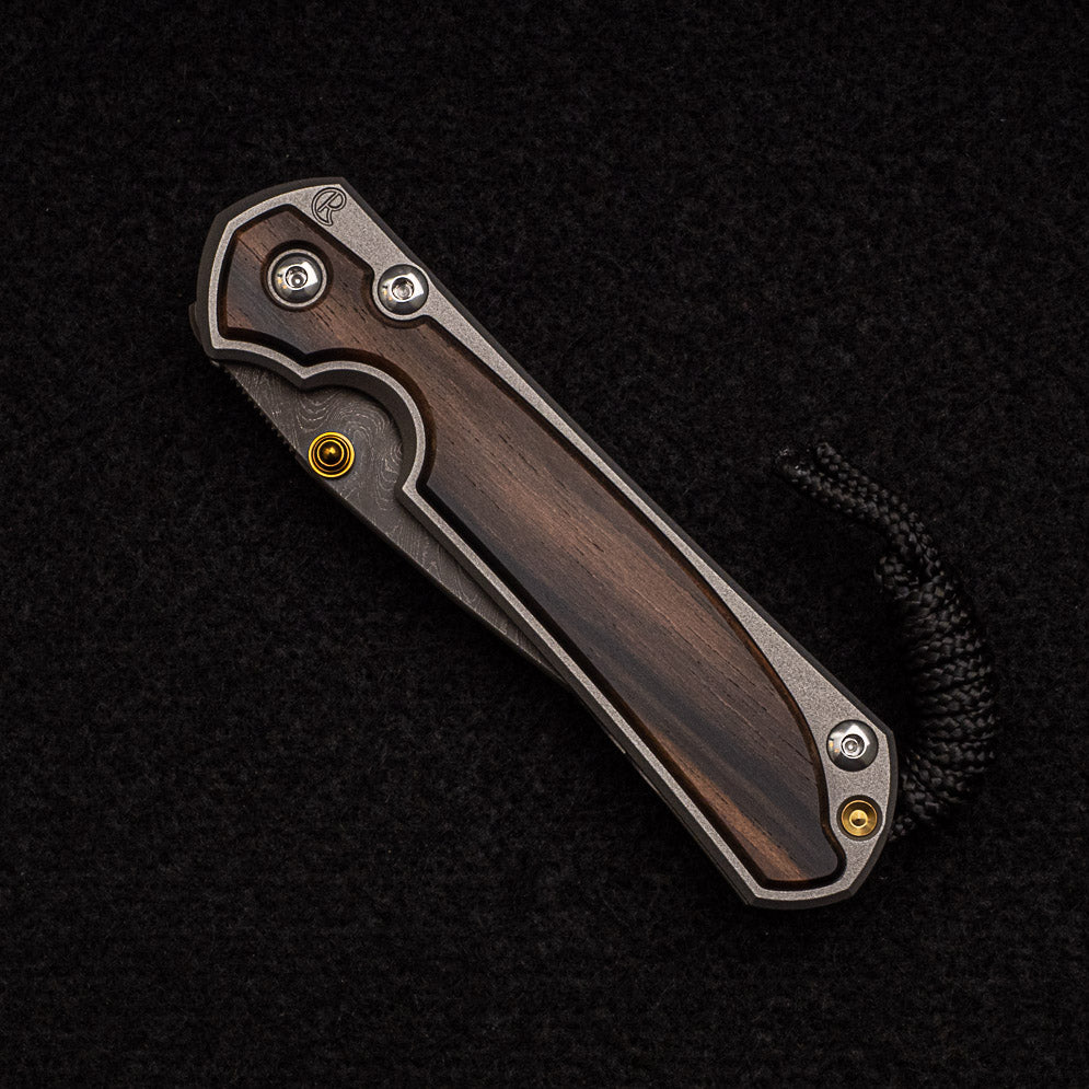 CHRIS REEVE SMALL SEBENZA 31 MACASSAR INLAY - BOOMERANG BLADE - GOLD DOUBLE THUMB LUGS