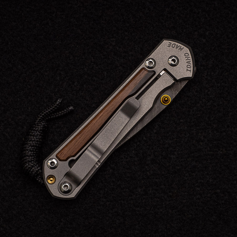 CHRIS REEVE SMALL SEBENZA 31 MACASSAR INLAY - BOOMERANG BLADE - GOLD DOUBLE THUMB LUGS