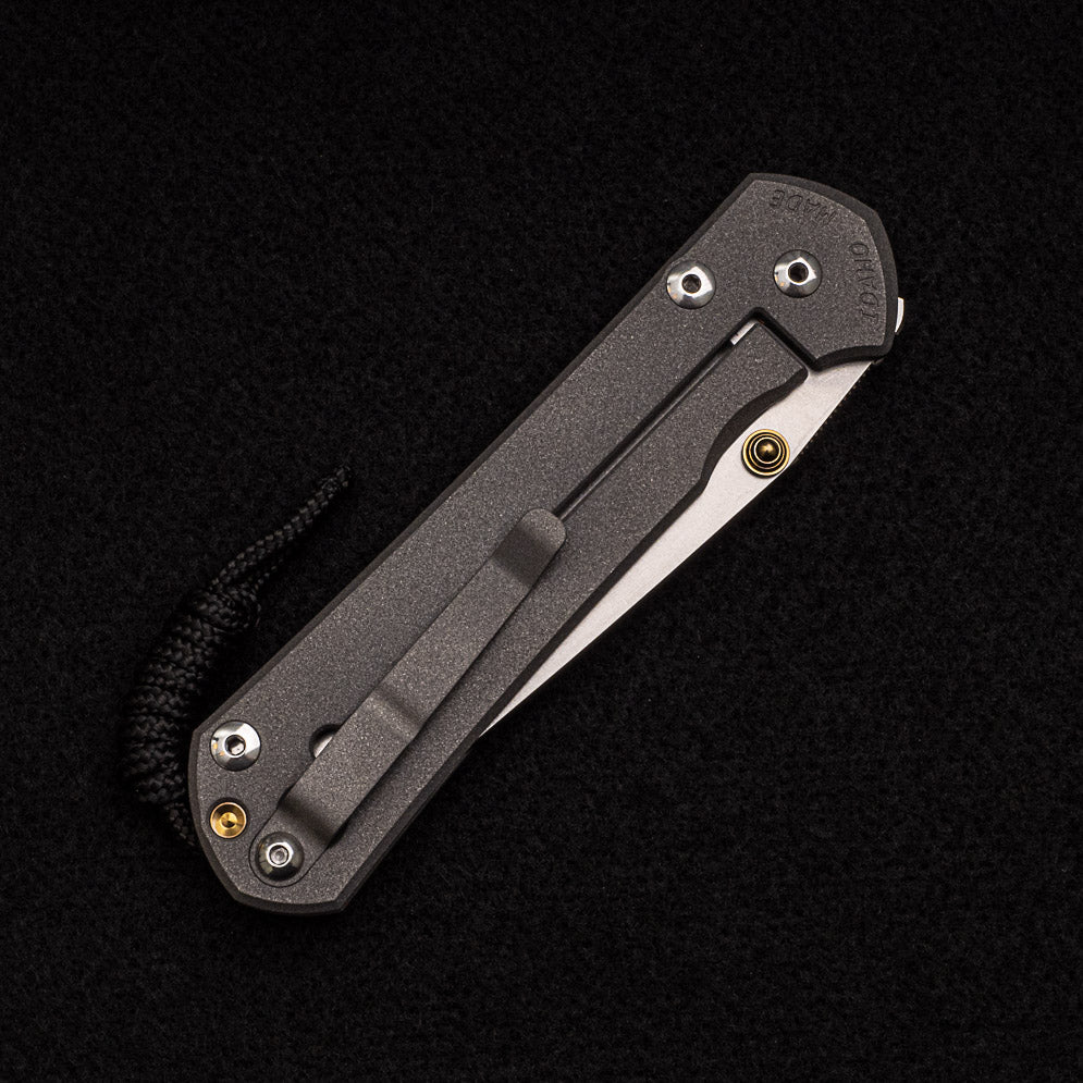 CHRIS REEVE LARGE SEBENZA 31 TANTO – GOLD DOUBLE THUMB LUGS – CPM MAGNACUT BLADE