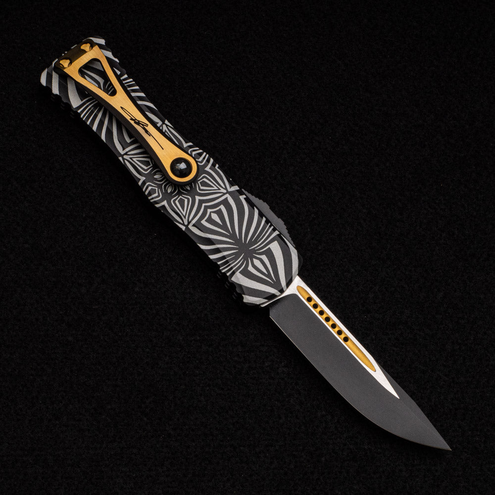 MICROTECH HERA S-E SIGNATURE SERIES – TWO-TONED BLACK W- GOLD ACCENTS ‘SOURCE’ ARTWORK 703-1TSOS