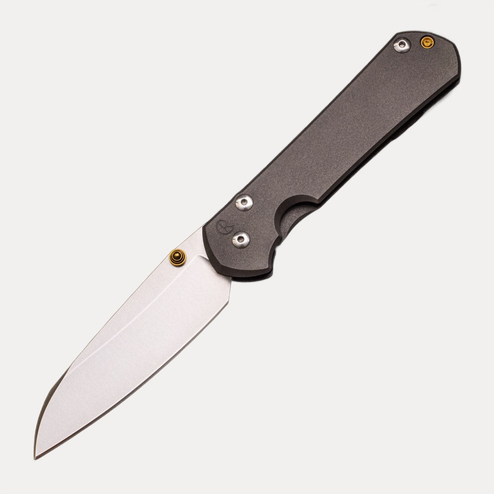 CHRIS REEVE LARGE SEBENZA 31 INSINGO – GOLD DOUBLE THUMB LUGS – CPM MAGNACUT BLADE