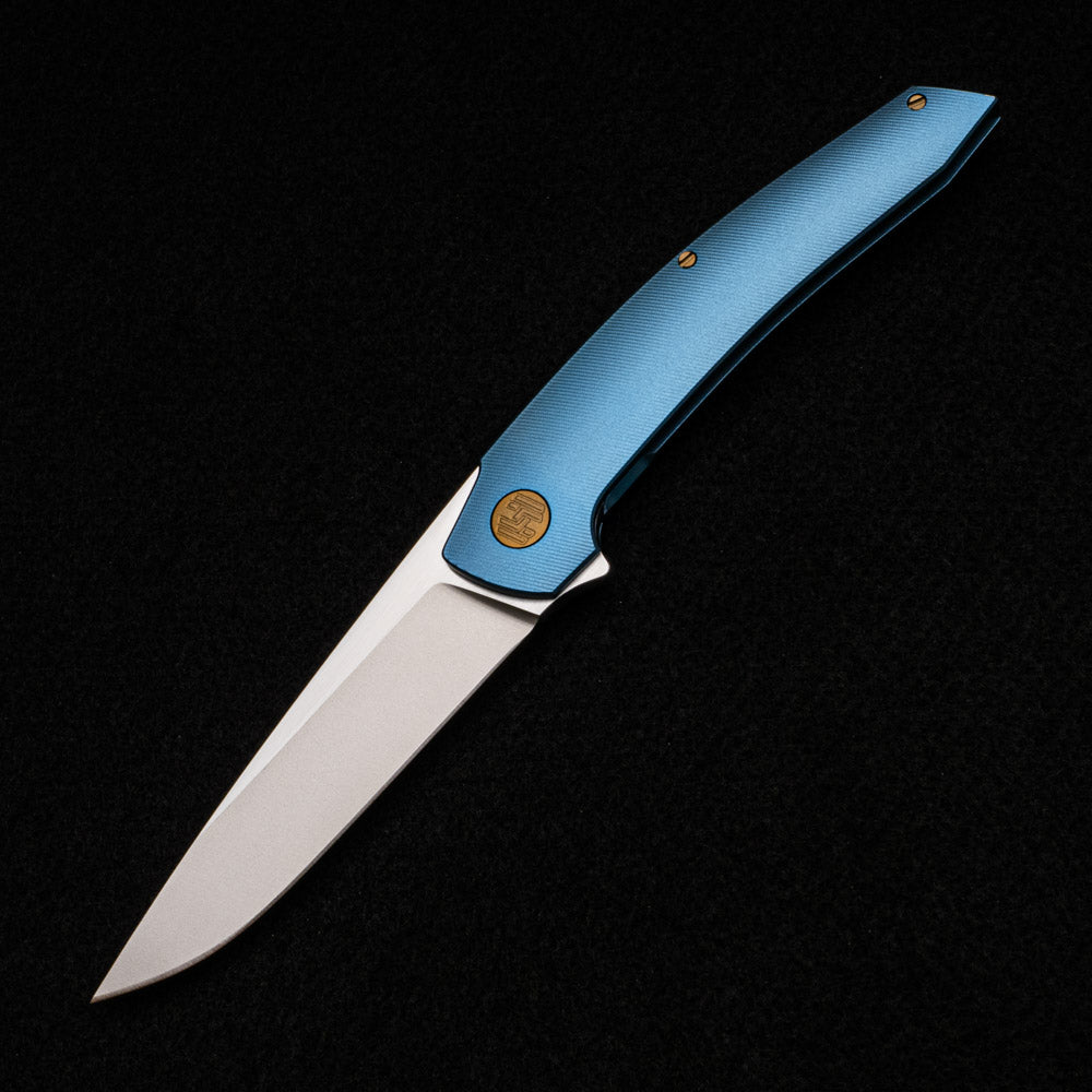 Hog House Knives Model T – RWL-34 BLADE W- SATIN FLATS – BLUE TI W- BRONZE