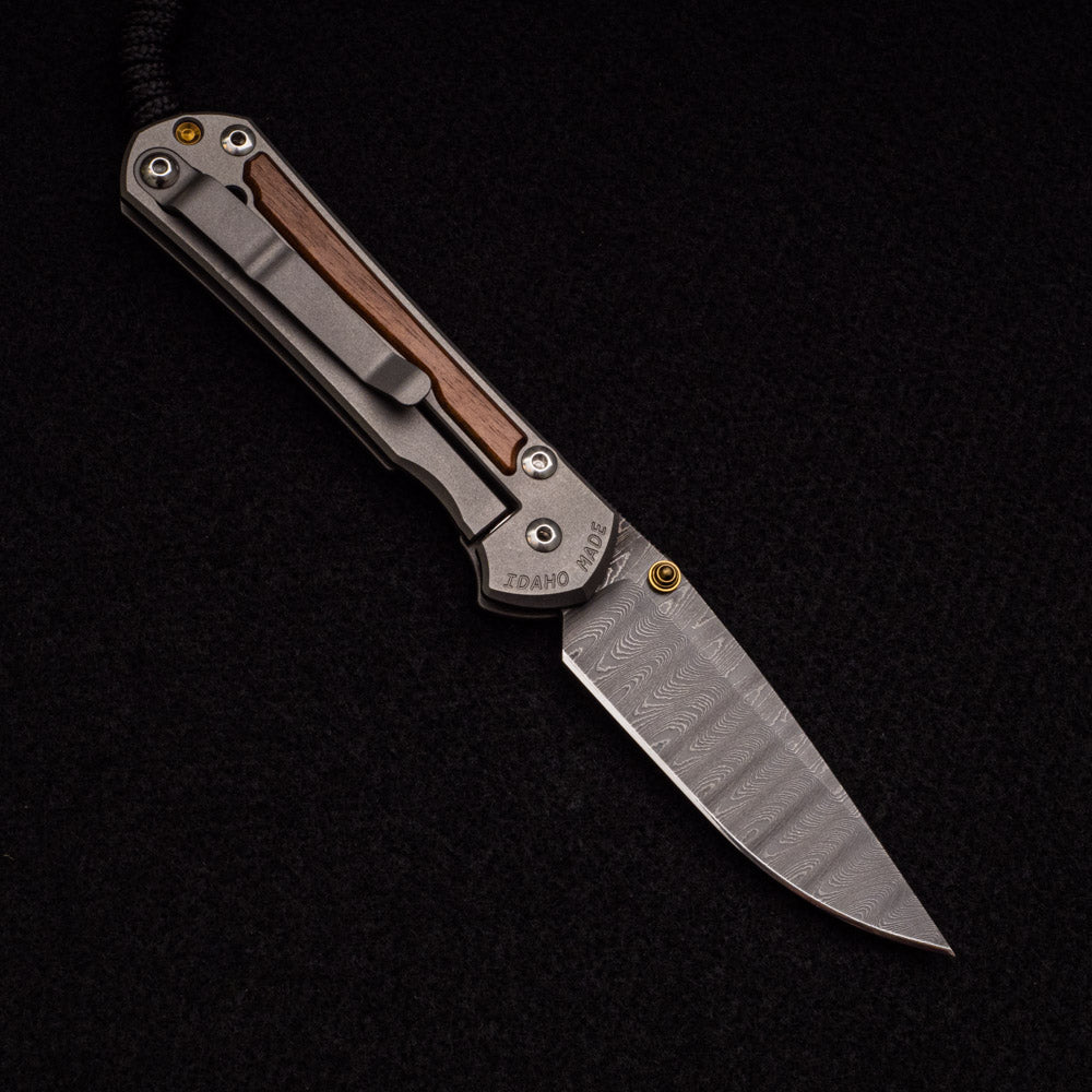 CHRIS REEVE SMALL SEBENZA 31 MACASSAR EBONY – LADDER BLADE – GOLD DOUBLE THUMB LUGS