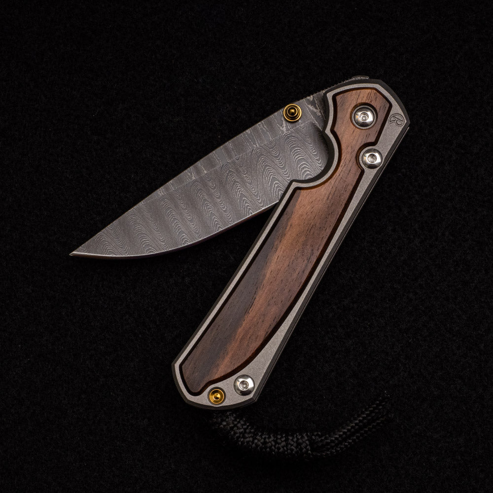 CHRIS REEVE SMALL SEBENZA 31 MACASSAR EBONY – LADDER BLADE – GOLD DOUBLE THUMB LUGS