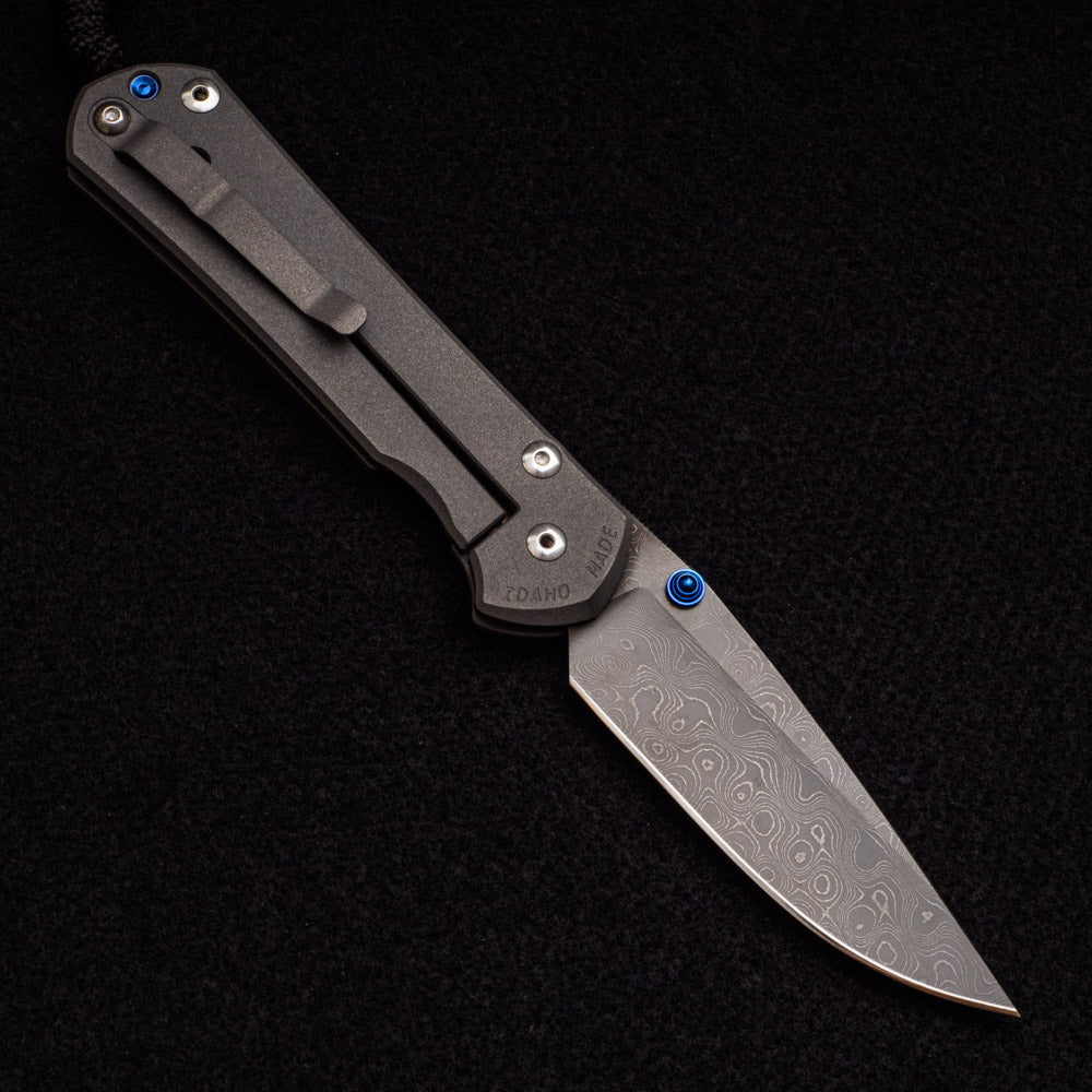 CHRIS REEVE LARGE SEBENZA 31 – BLUE DOUBLE THUMB LUGS – RAINDROP BLADE