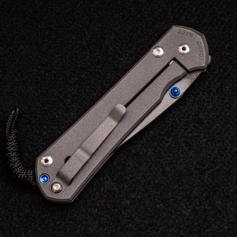 CHRIS REEVE LARGE SEBENZA 31 – BLUE DOUBLE THUMB LUGS – RAINDROP BLADE