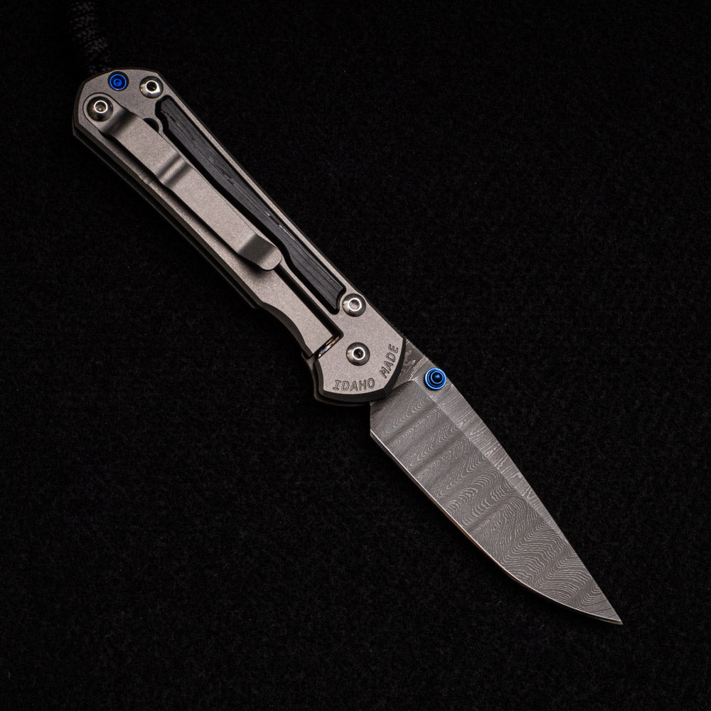 CHRIS REEVE SMALL SEBENZA 31 BOG OAK INLAY – LADDER BLADE – BLUE DOUBLE THUMB LUGS