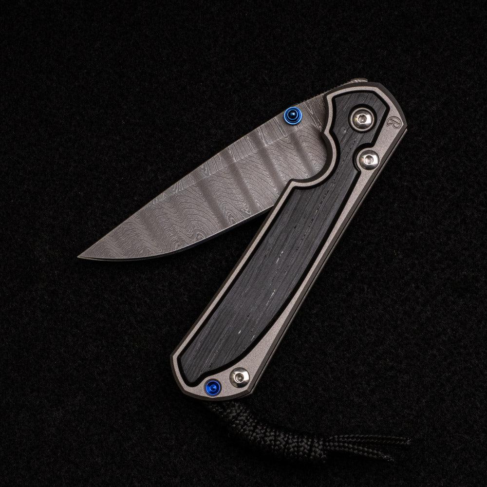 CHRIS REEVE SMALL SEBENZA 31 BOG OAK INLAY – LADDER BLADE – BLUE DOUBLE THUMB LUGS