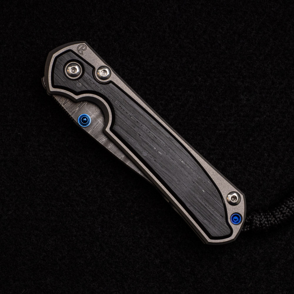 CHRIS REEVE SMALL SEBENZA 31 BOG OAK INLAY – LADDER BLADE – BLUE DOUBLE THUMB LUGS