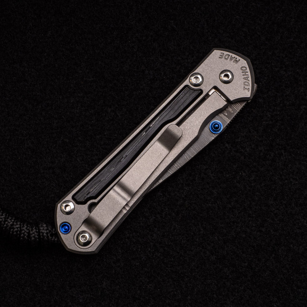 CHRIS REEVE SMALL SEBENZA 31 BOG OAK INLAY – LADDER BLADE – BLUE DOUBLE THUMB LUGS