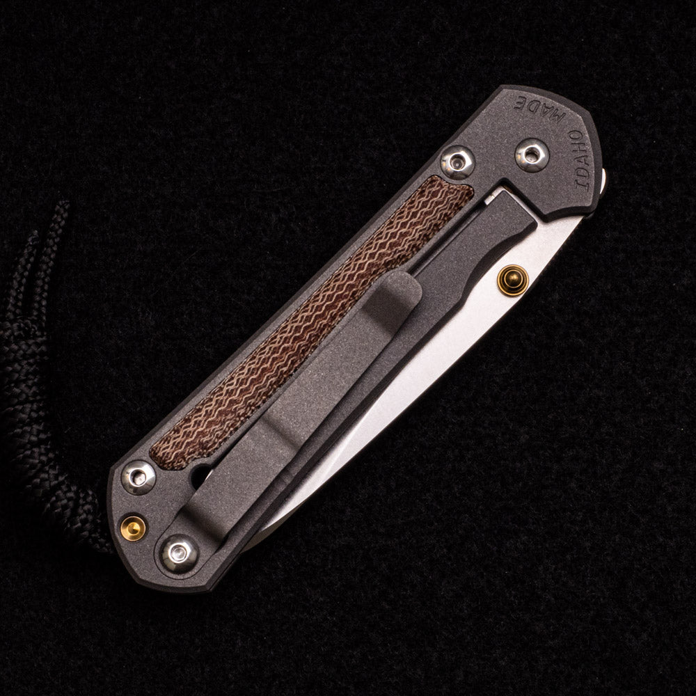 CHRIS REEVE SMALL SEBENZA 31 NATURAL CANVAS MICARTA INLAY – CPM MAGNACUT INSINGO BLADE – GOLD DOUBLE THUMB LUGS