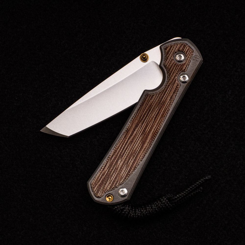 CHRIS REEVE SMALL SEBENZA 31 NATURAL CANVAS MICARTA INLAY – CPM MAGNACUT TANTO BLADE – GOLD DOUBLE THUMB LUGS