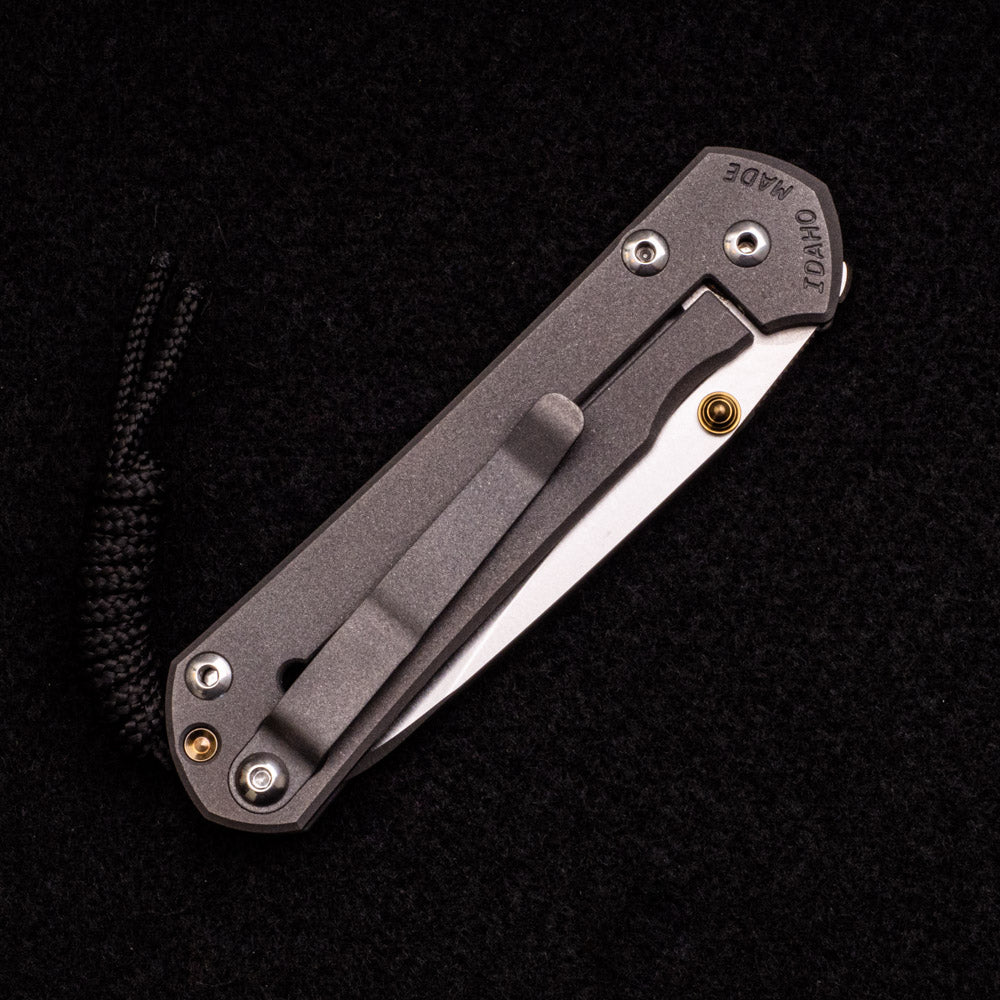 CHRIS REEVE SMALL SEBENZA 31 – INSINGO CPM MAGNACUT BLADE – GOLD DOUBLE THUMB LUGS