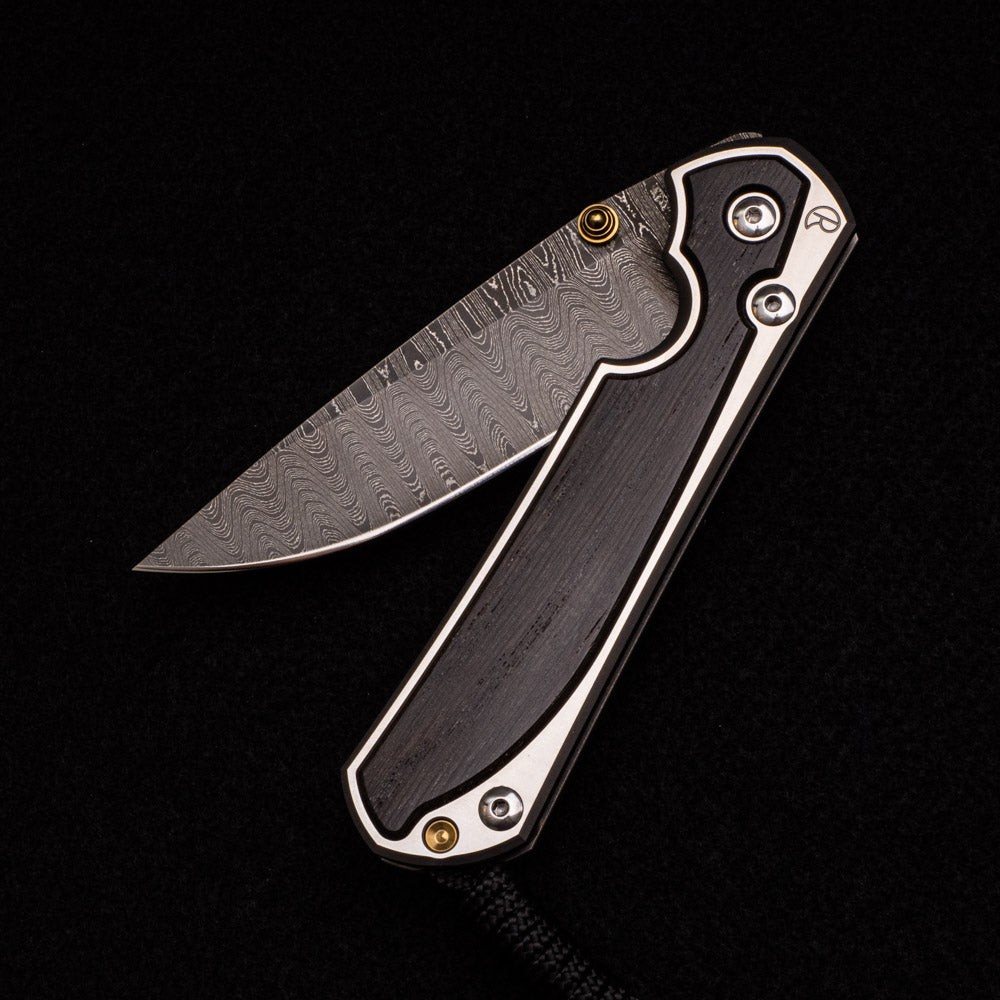 CHRIS REEVE LARGE SEBENZA 31 BOG OAK – LADDER BLADE – GOLD SINGLE THUMB LUG