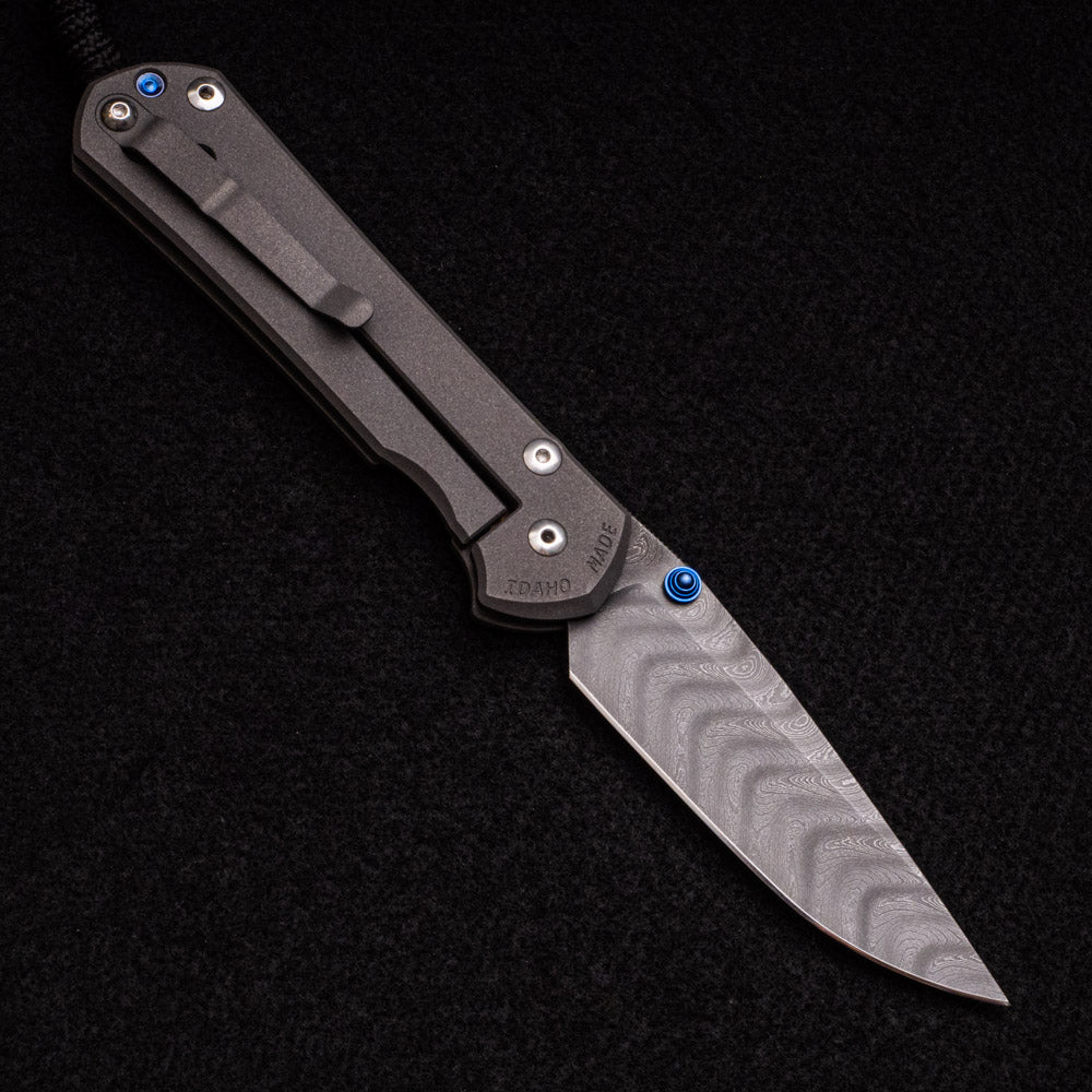 CHRIS REEVE LARGE SEBENZA 31 – BLUE DOUBLE THUMB LUGS – BOOMERANG BLADE