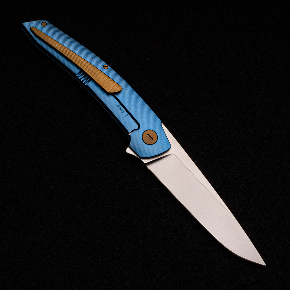 Hog House Knives Model T – RWL34 BLADE – BLUE TI W- BRONZE