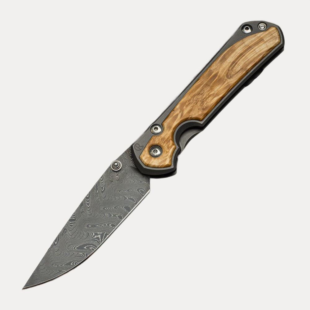 CHRIS REEVE LARGE SEBENZA 31 BOX ELDER BURL INLAY - BOOMERANG BLADE - SILVER DOUBLE THUMB LUGS