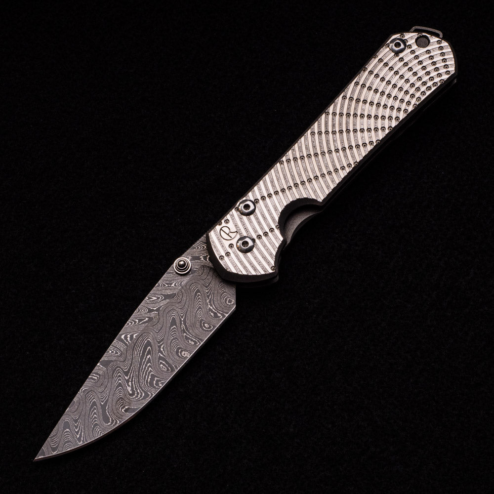 CHRIS REEVE LARGE SEBENZA 31 UNIQUE GRAPHIC – BOOMERANG BLADE – DOUBLE SILVER LUGS