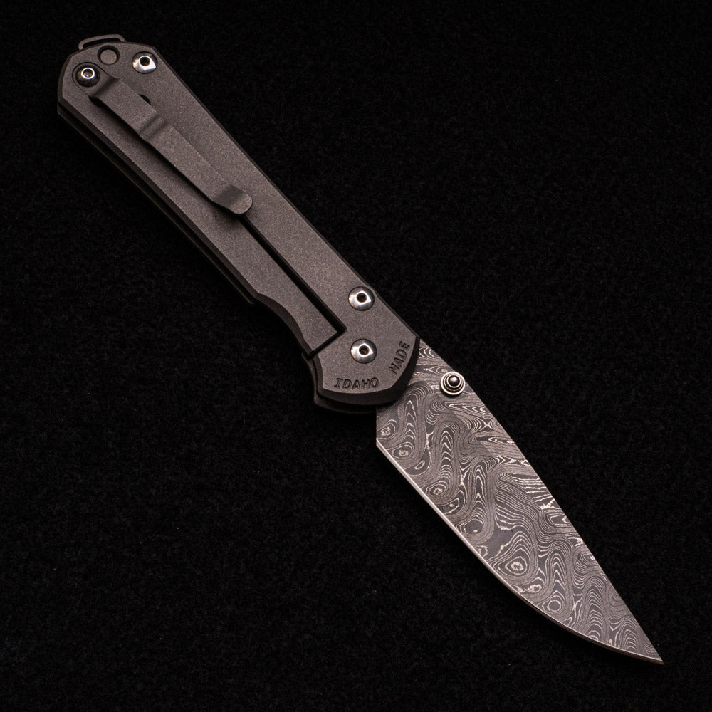 CHRIS REEVE LARGE SEBENZA 31 UNIQUE GRAPHIC – BOOMERANG BLADE – DOUBLE SILVER LUGS