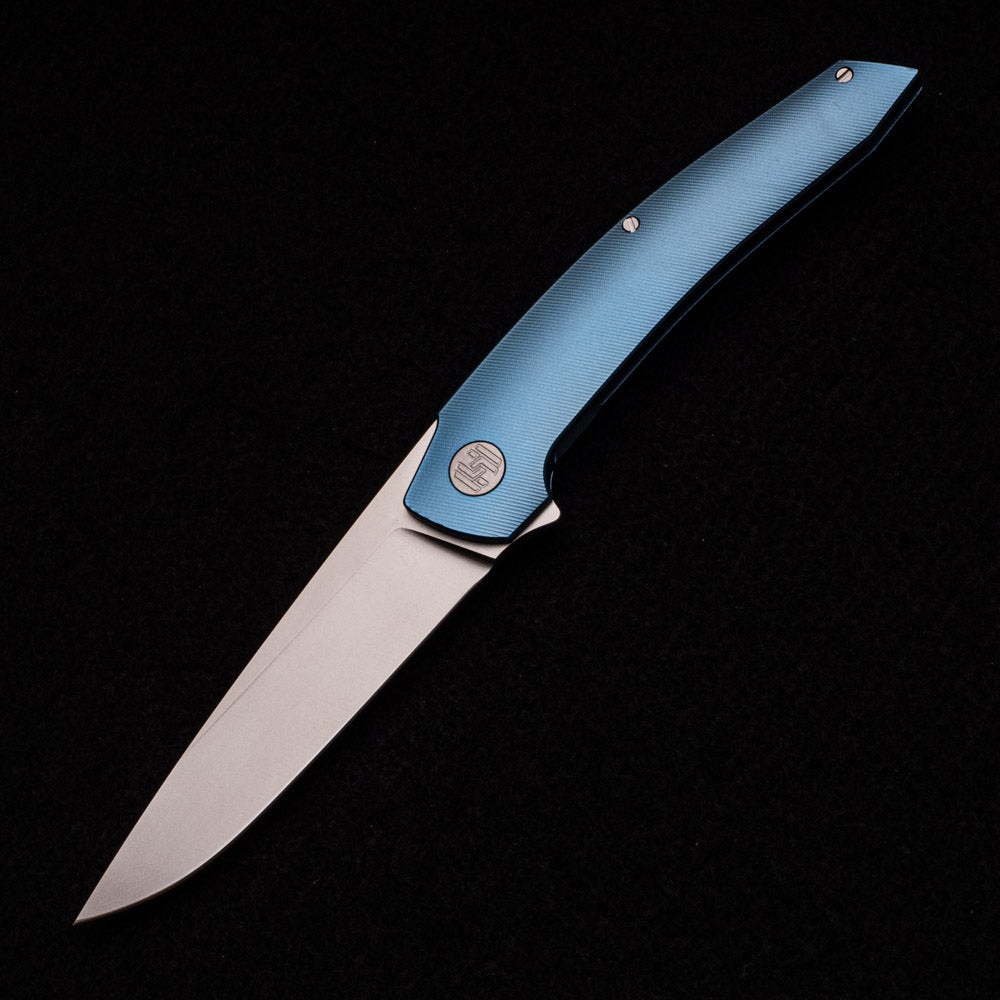 Hog House Knives Model T – RWL-34 BLADE – BLUE TI W- SILVER