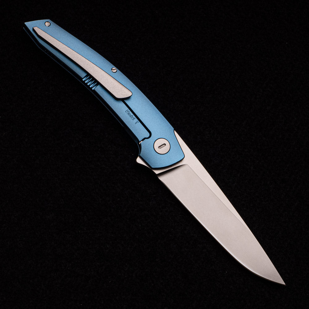 Hog House Knives Model T – RWL-34 BLADE – BLUE TI W- SILVER