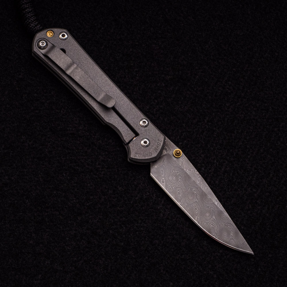 CHRIS REEVE SMALL SEBENZA 31 – RAINDROP BLADE – GOLD DOUBLE THUMB LUGS