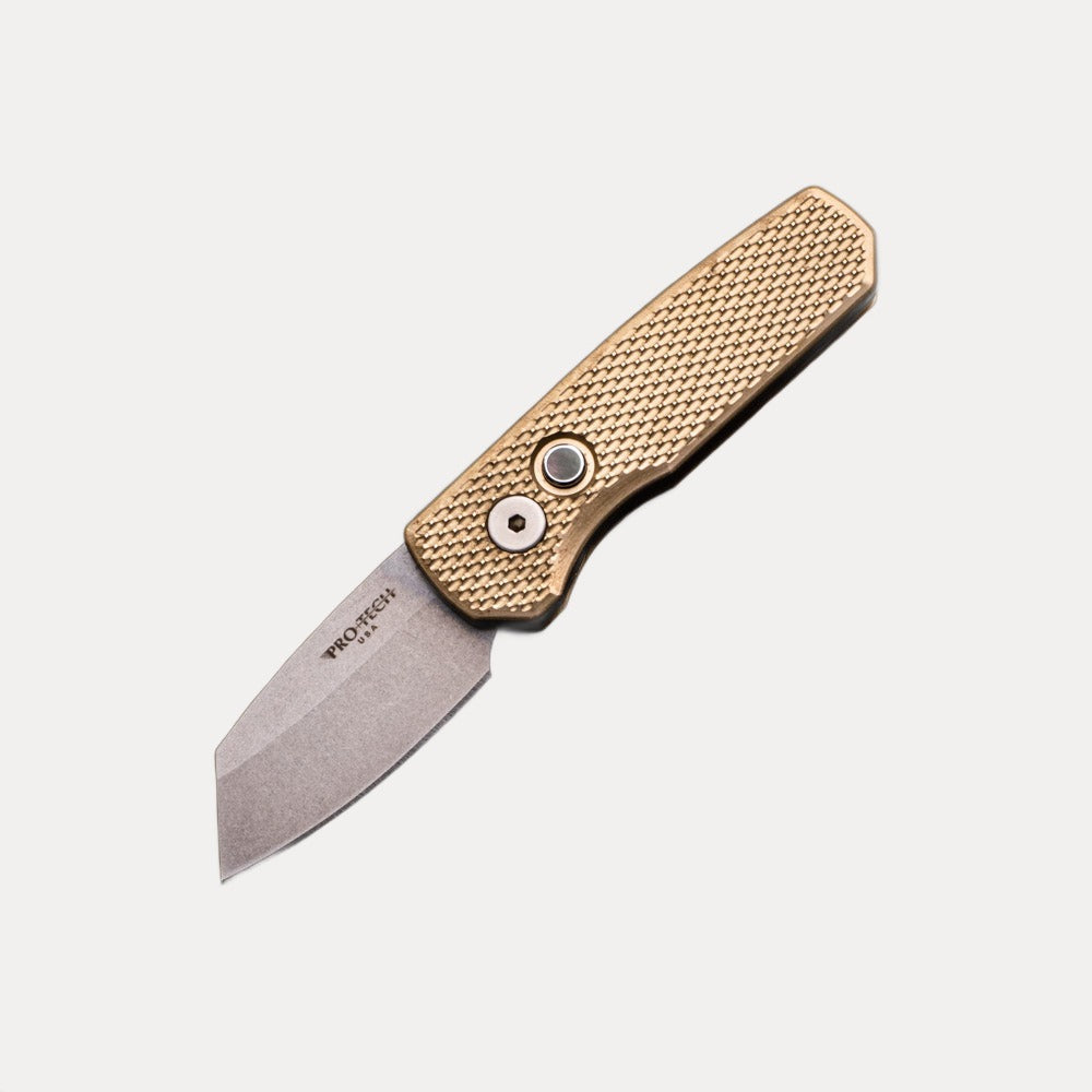 Pro-Tech Knives Runt 5 Limited – Textured Bronze AL Handle – MOP Button – Stonewash Magnacut Reverse Tanto Blade