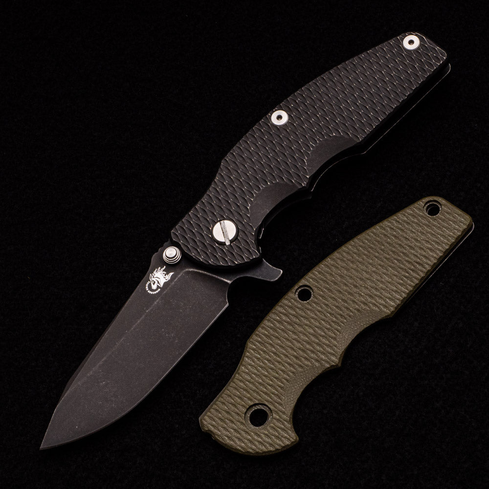 Hinderer Knives Jurassic 3.5″ – Spearpoint – Tri-Way – Battle Black – OD Green G10 W- Extra Battle Black Titanium