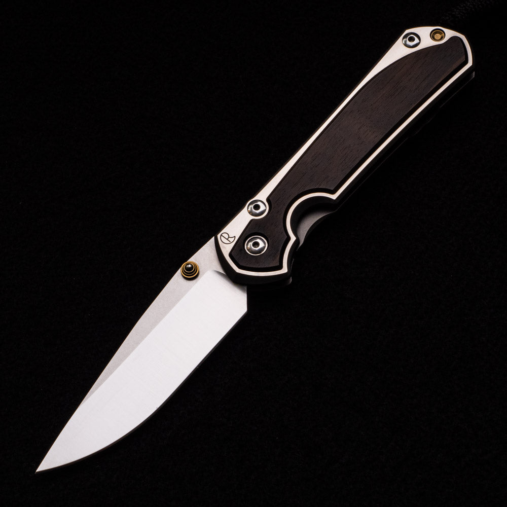 Chris Reeve Large Sebenza 31 – Macassar Ebony Inlay – Polished Drop Point CPM S45VN Blade – Gold Thumb Lug