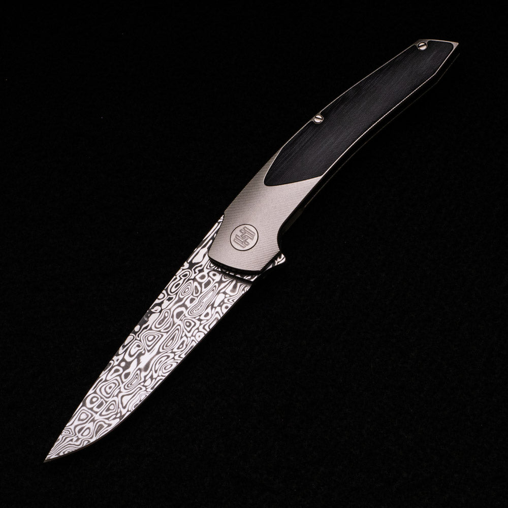 Hog House Knives Model T – Damasteel Blade – TI W- Silver – Black Micarta Inlay