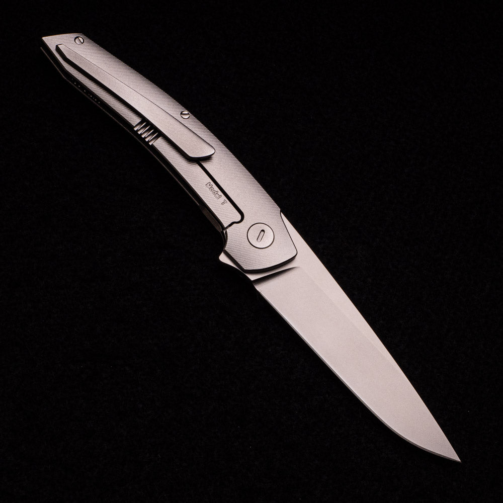 Hog House Knives Model T – RWL-34 Blade – TI W- Silver – Black Micarta Inlay