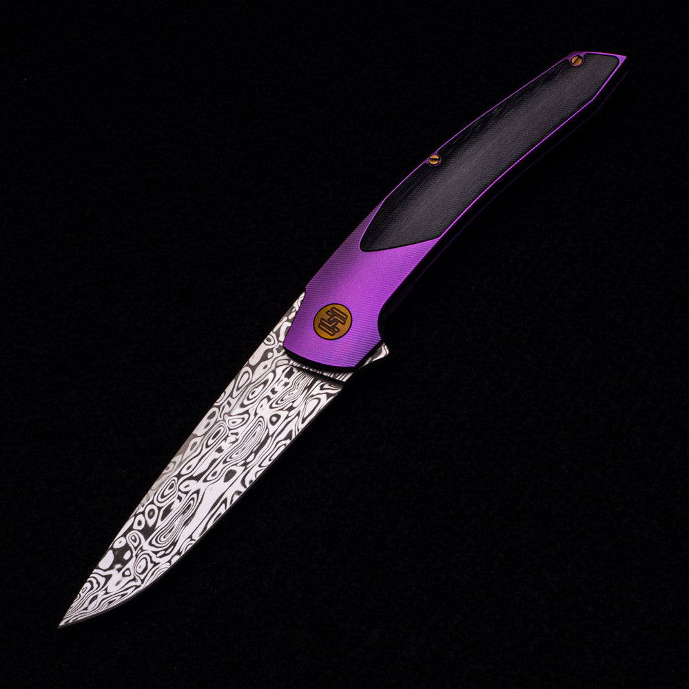 Hog House Knives Model T – Damasteel Blade – Purple Ti W- Bronze – Black Micarta Inlay