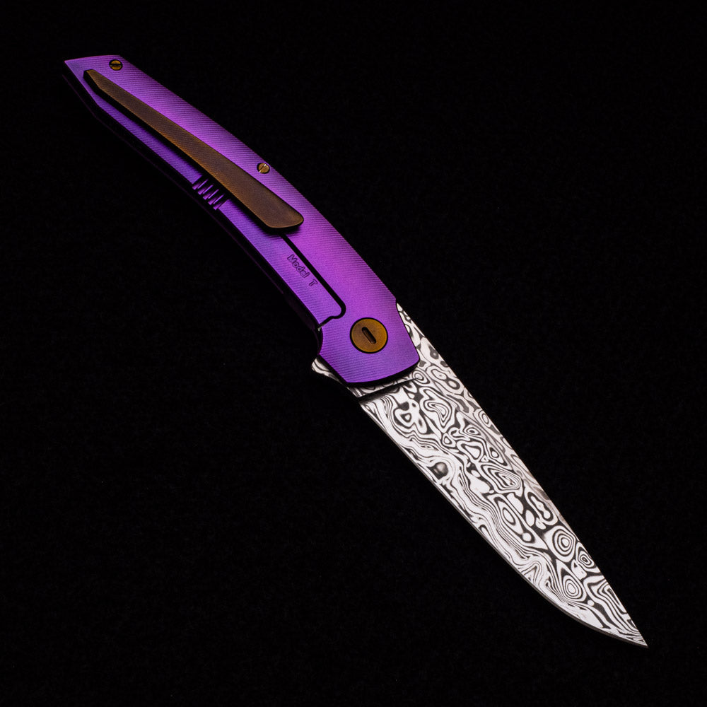 Hog House Knives Model T – Damasteel Blade – Purple Ti W- Bronze – Black Micarta Inlay