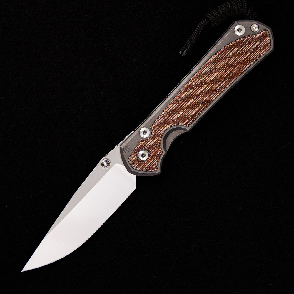 CHRIS REEVE LARGE SEBENZA 31 NATURAL CANVAS MICARTA INLAY – POLISHED CPM MAGNACUT BLADE – GLASS BLASTED – SILVER DOUBLE THUMB LUGS