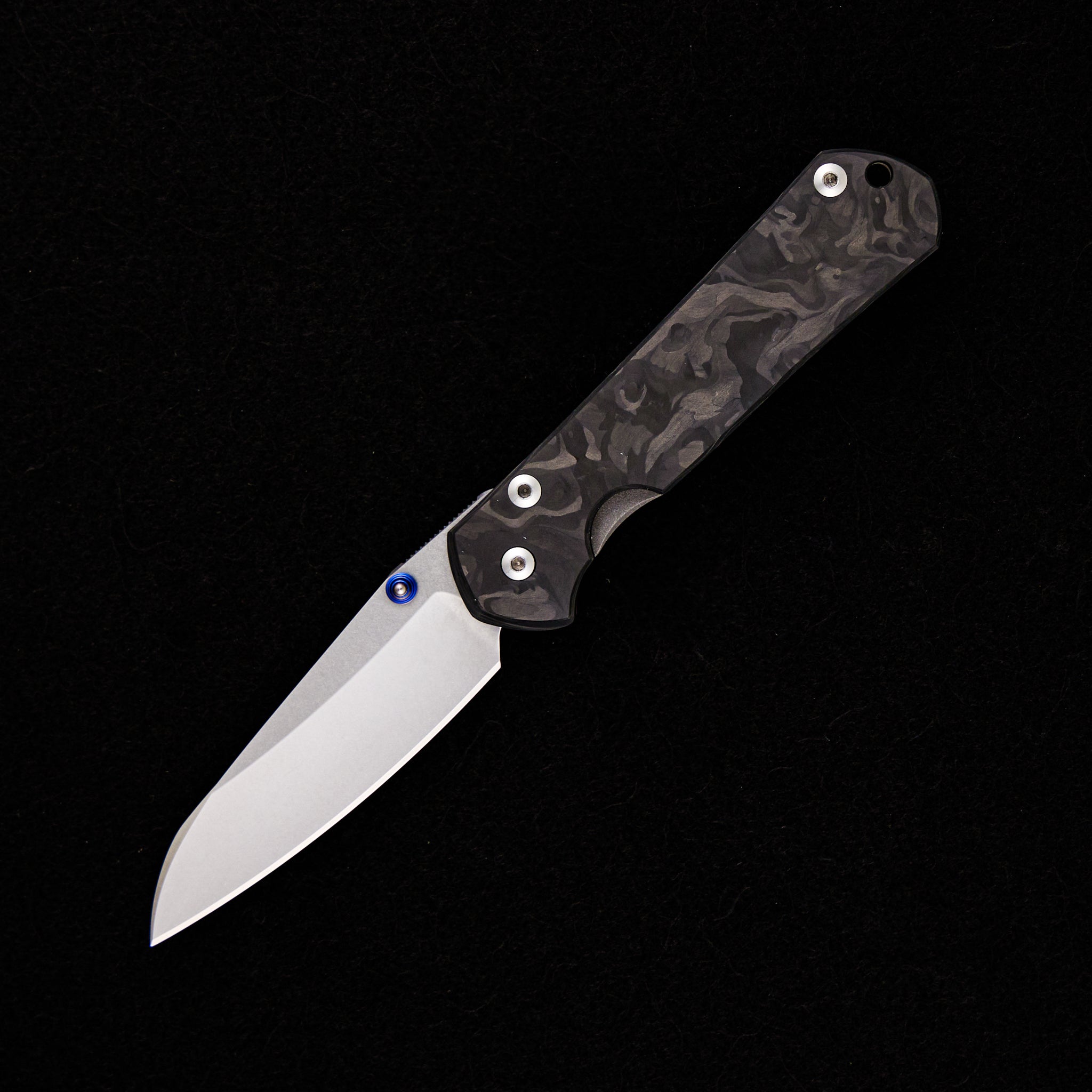 CHRIS REEVE SMALL SEBENZA 31 – TITANIUM/MARBLE CARBON FIBER HANDLE – MAGNACUT INSINGO BLADE – BLUE SINGLE LUG