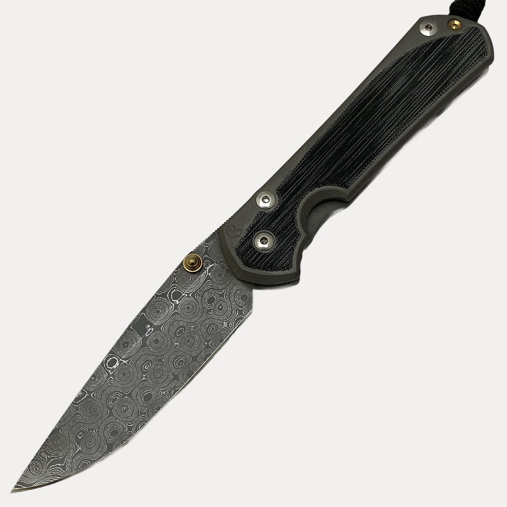 CHRIS REEVE LARGE SEBENZA 31 BLACK CANVAS MICARTA INLAY RAINDROP BLADE - GOLD DOUBLE THUMB LUGS