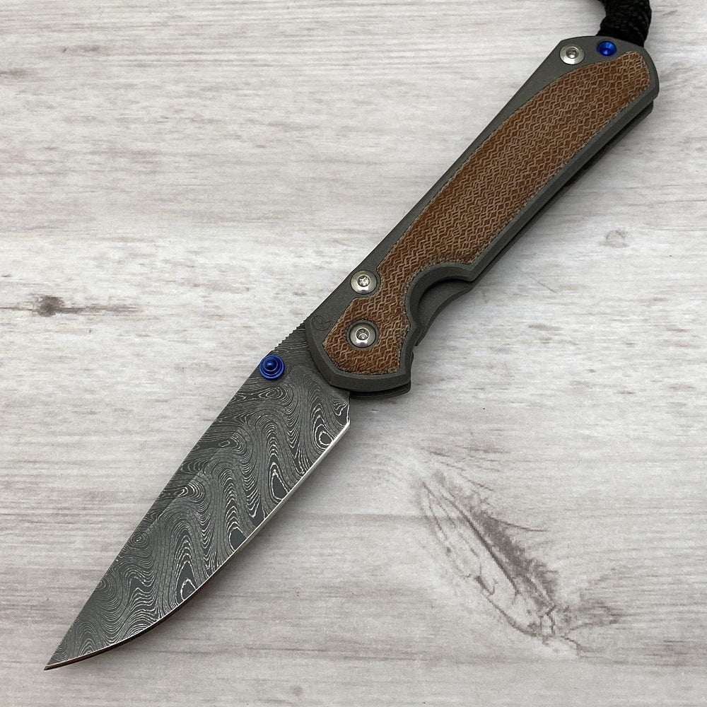 CHRIS REEVE SMALL SEBENZA 31 NATURAL CANVAS MICARTA INLAY - BOOMERANG BLADE - BLUE DOUBLE THUMB LUGS