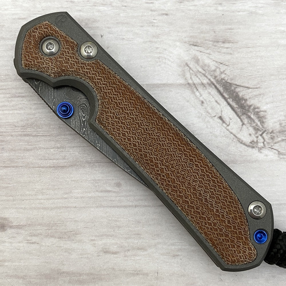 CHRIS REEVE SMALL SEBENZA 31 NATURAL CANVAS MICARTA INLAY - BOOMERANG BLADE - BLUE DOUBLE THUMB LUGS