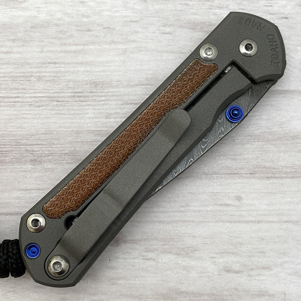 CHRIS REEVE SMALL SEBENZA 31 NATURAL CANVAS MICARTA INLAY - BOOMERANG BLADE - BLUE DOUBLE THUMB LUGS