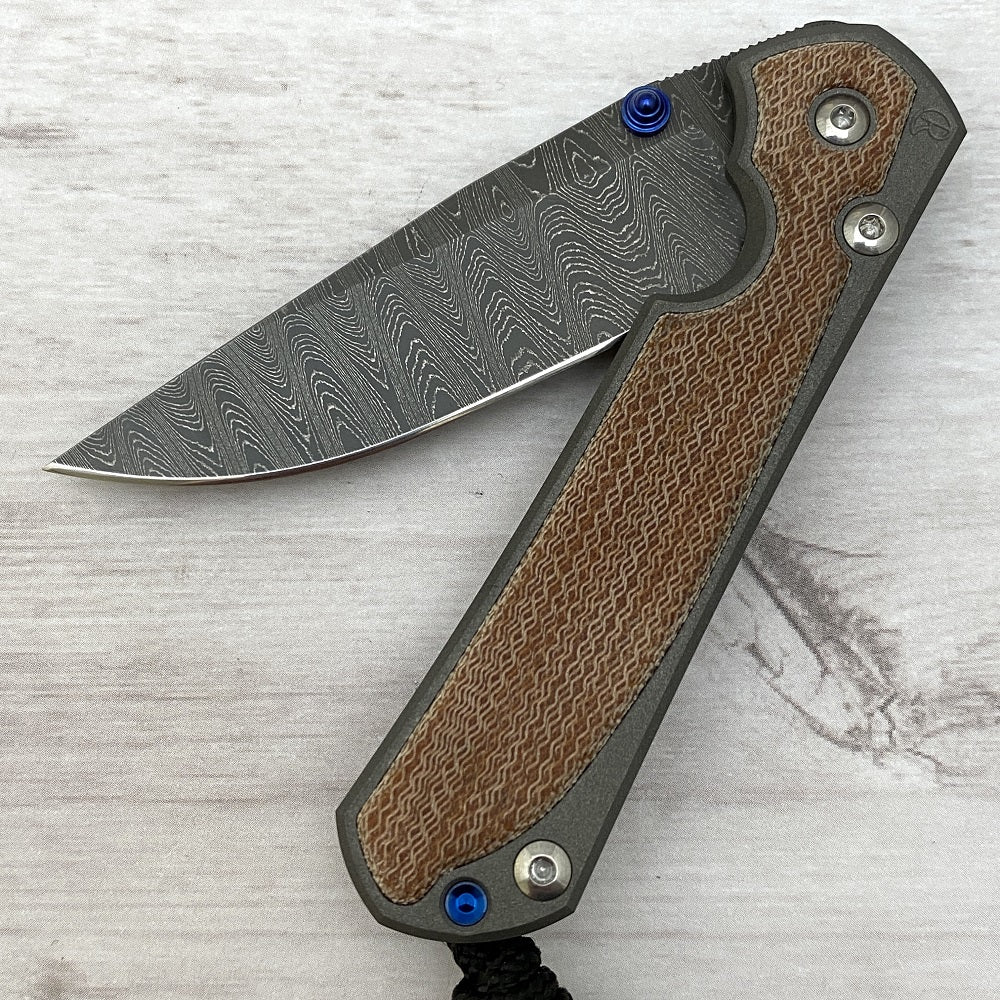 CHRIS REEVE SMALL SEBENZA 31 NATURAL CANVAS MICARTA INLAY - LADDER BLADE - BLUE DOUBLE THUMB LUGS