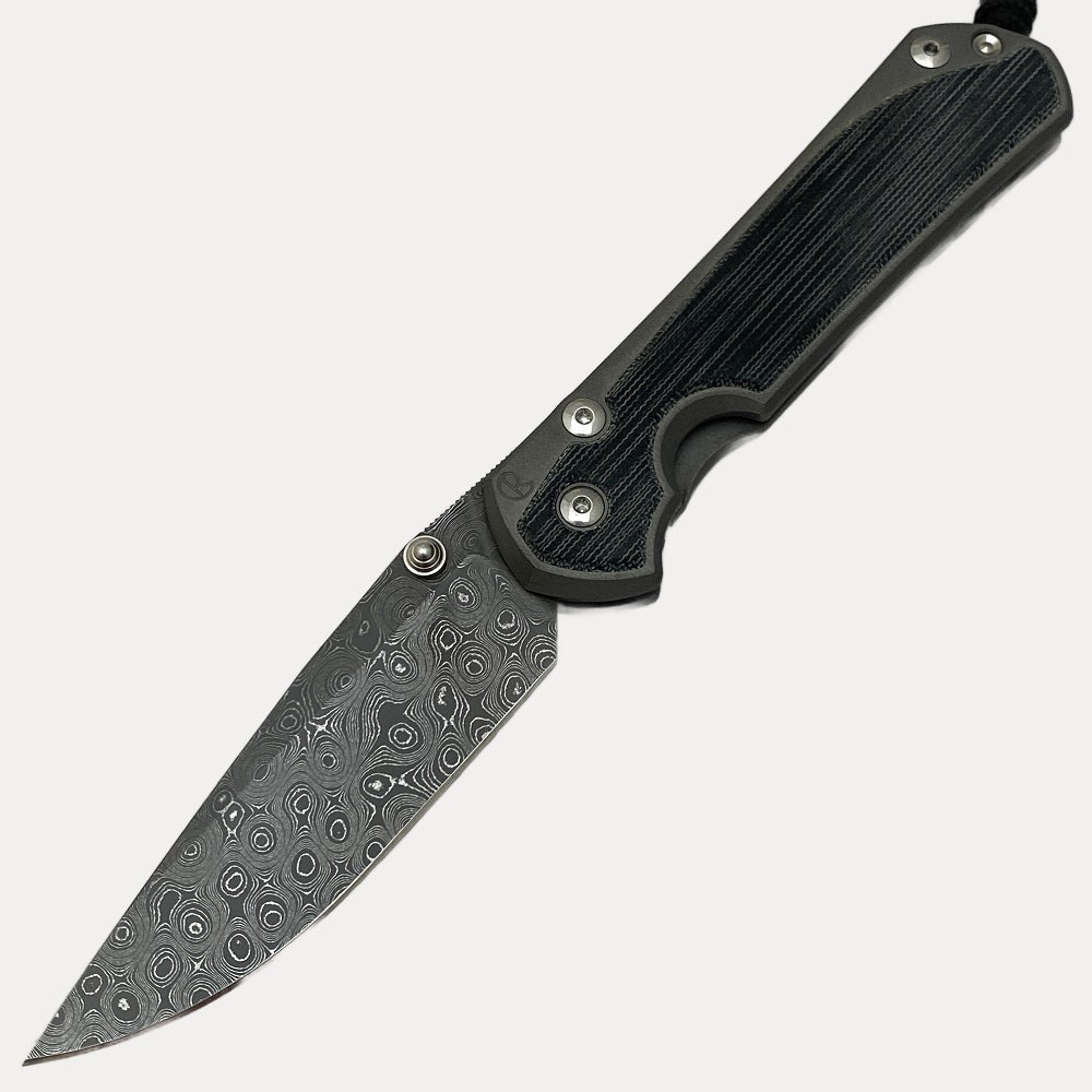 CHRIS REEVE LARGE SEBENZA 31 BLACK CANVAS MICARTA INLAY RAINDROP BLADE - SILVER DOUBLE THUMB LUGS