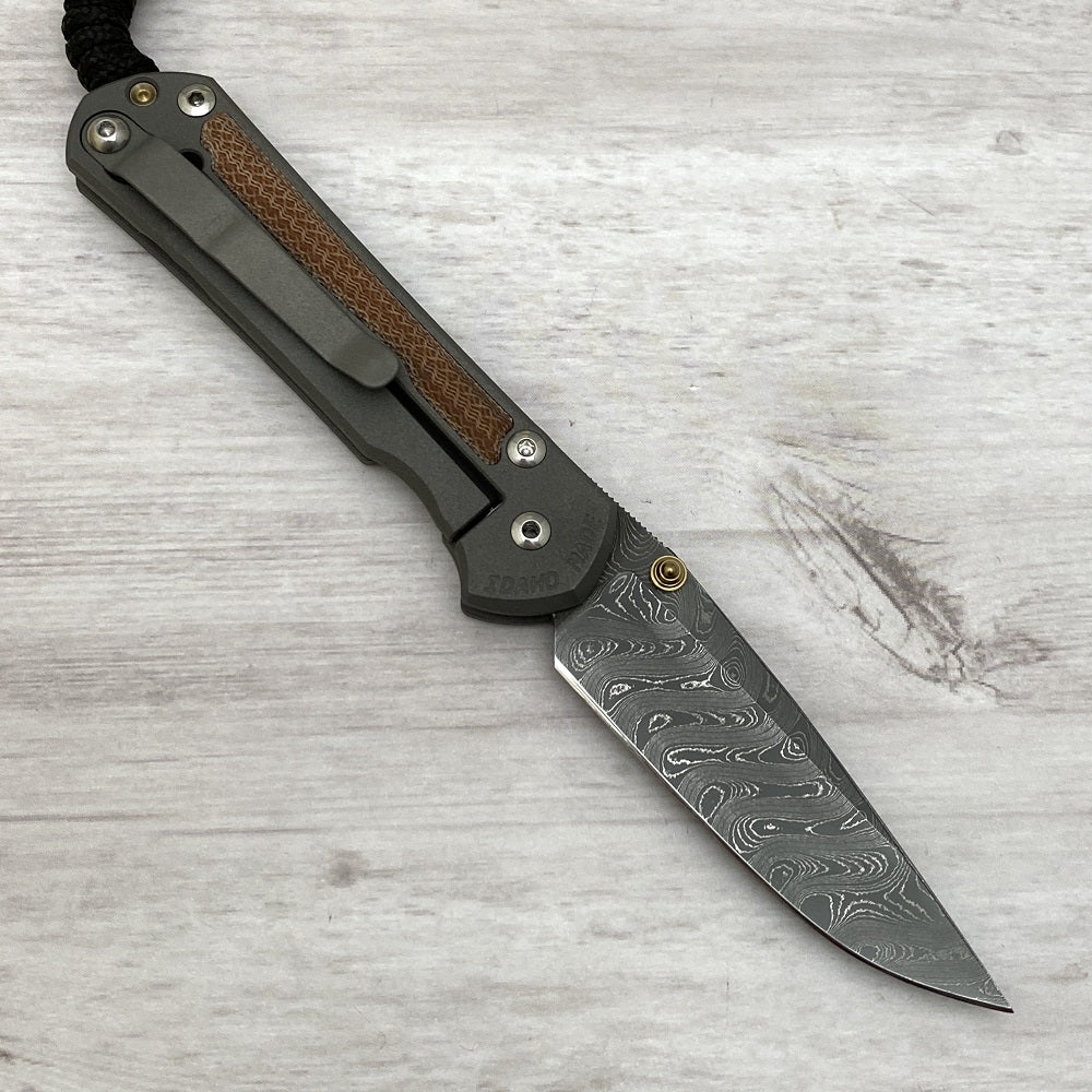 CHRIS REEVE SMALL SEBENZA 31 NATURAL CANVAS MICARTA INLAY - BOOMERANG BLADE - GOLD DOUBLE THUMB LUGS